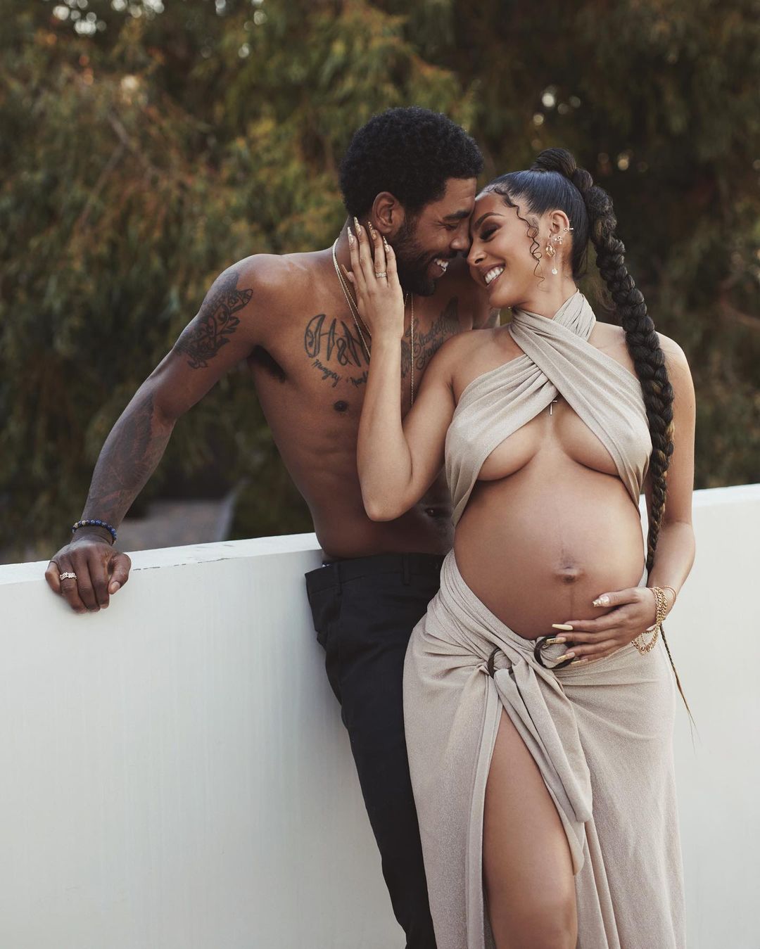 Marlene Wilkerson and Kyrie Irving from her Instagram: “14 months postpartum and it’s my favorite journey yet. A teacher, leader, explorer, observer, and protector. The most gentle father and best friend. We celebrate your presence and impact daily✨ @blaircaldwell captured these beautiful photos almost 2 years ago with 24 hours notice 😫 @hotlikefirre came through with the last minute beat and @hair.byimani__ got my hair together. So grateful this last minute shoot came together and I am about to post these individually because, art by Blair, love by US💛 💁🏽‍♀️✨” 